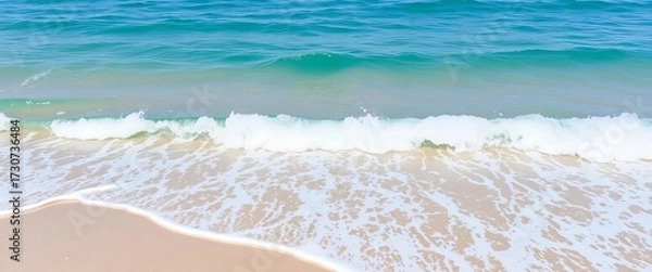 Fototapeta Serene turquoise ocean waves gently lapping a sandy shore, background, summer