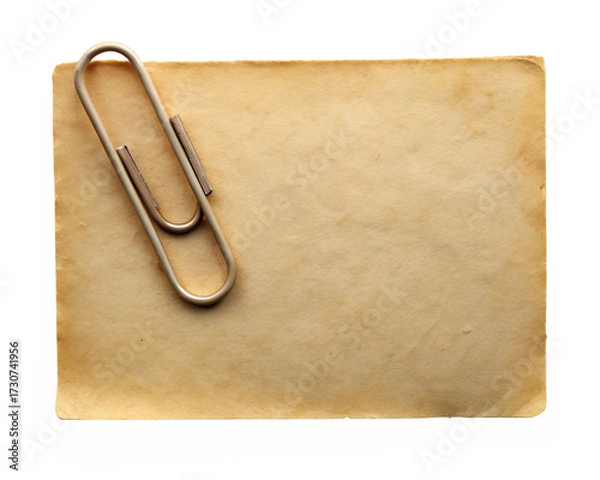 Fototapeta A vintage paper with a metal paperclip attached, isolated on transparent background