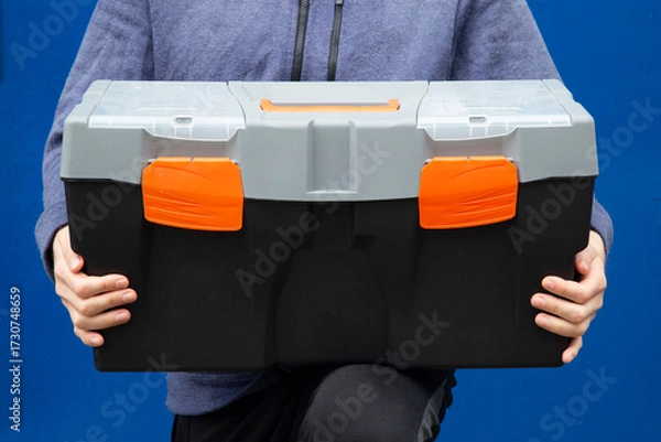 Fototapeta The toolbox is in the master's hands.