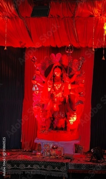 Fototapeta Idol of Goddess Devi Durga at a decorated puja pandal , Durga Puja is a famous and major religious traditional festival of Hinduism that is celebrated throughout the world.

