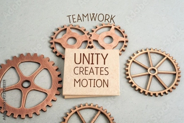 Fototapeta Wooden sign with gears representing teamwork and unity