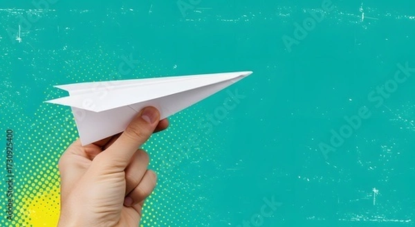 Fototapeta Paper Airplane in Hand on Abstract Background