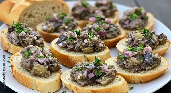 Fototapeta Delicious appetizers with bread slices garnished with fresh herbs