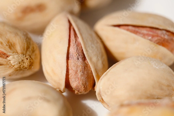 Obraz pistachio nuts isolated on white