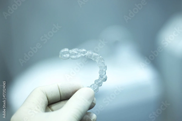 Fototapeta Invisible teeth aligners brackets