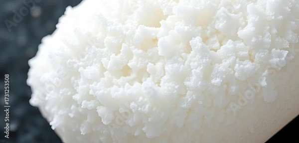 Fototapeta Close-up of a scrub sponge, luxuriously covered in thick white foam,  studio shot,  studio