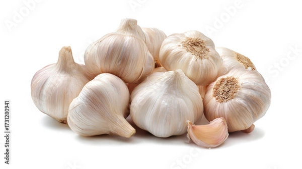 Fototapeta A collection of garlic cloves isolated on a white background