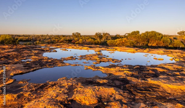Fototapeta Reflections in a pond in the outback of the Murchison Region of Western Australia
