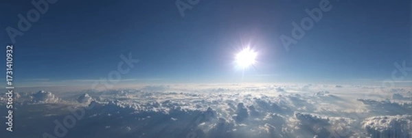 Fototapeta Breathtaking hdr panoramic view of clouds and sun above the horizon aerial perspective