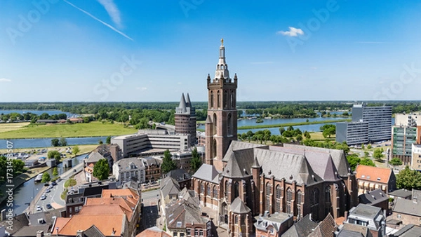 Fototapeta Aerial drone view of Roermond town cityscape, church and river Meuse top view from above, traditional Dutch architecture, Limburg, the Netherlands 
