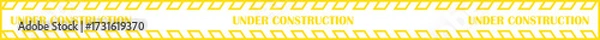 Fototapeta Under construction banner icon. Caution warning tape vector illustration in trendy yellow line style. Safety barrier stripe design for road work, building site, repair and maintenance graphic.