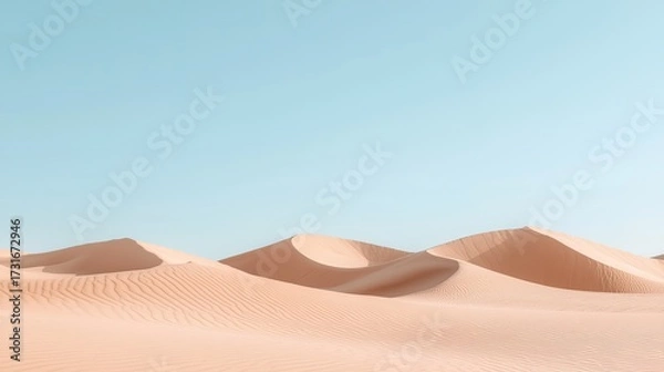 Fototapeta Vast sandy desert dunes under a clear blue sky with smooth, flowing shapes and warm tones.