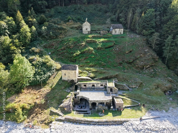 Fototapeta Drone view at Craveggia baths on Onsernone valley in Switzerland