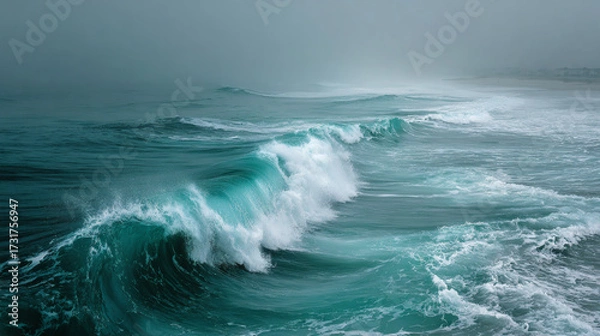 Fototapeta Captivating Moment of a Powerful Ocean Wave Crashing with Misty Background