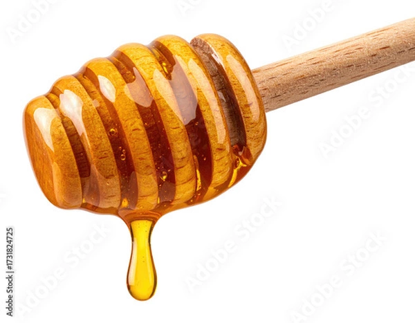 Fototapeta Honey dripping from a wooden honey dipper