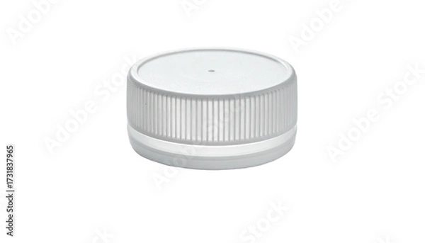 Fototapeta A close-up shot of a white plastic bottle cap on a dark, blurred background