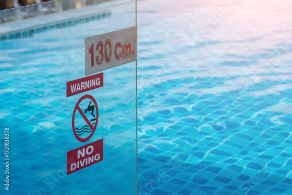Obraz No diving sign at the public pool area warning about the water depth