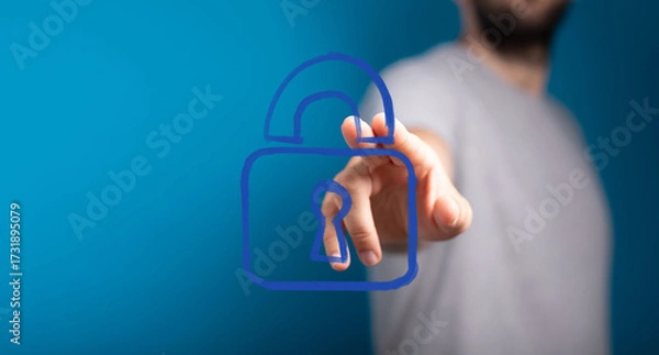Fototapeta Hand touching a virtual unlock padlock icon, representing digital security, open access, and data protection. Perfect for cybersecurity and priv