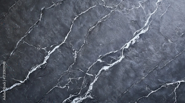 Fototapeta Dark Marble Texture: An abstract shot that offers a striking, high-resolution image of dark marble, its surface intricately veined with contrasting lighter hues, capturing elegance.