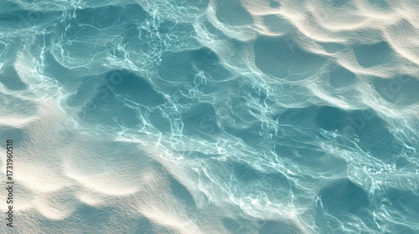 Fototapeta Underwater Abstraction: An overhead view of the ocean's surface, revealing intricate patterns of light and texture, offering a calming aesthetic.