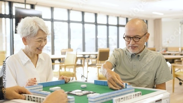 Obraz 介護施設で麻雀を楽しむアジア人高齢者