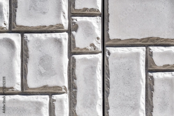 Fototapeta background the wall with decorative masonry