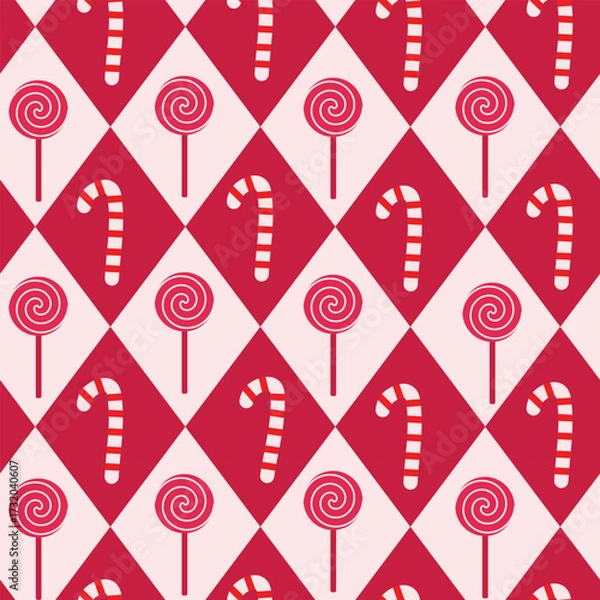 Fototapeta Cute Christmas candy cane and sticks on red and white diamond shapes seamless pattern. For wrapping paper, greeting cards and fabric.