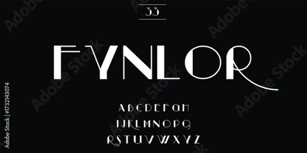 Fototapeta Elegant fynlor typeface with uppercase alphabet displayed on black background