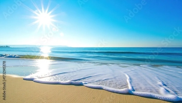 Fototapeta Sunburst over Gentle Waves on a Golden Beach, Serene Coastal Sce