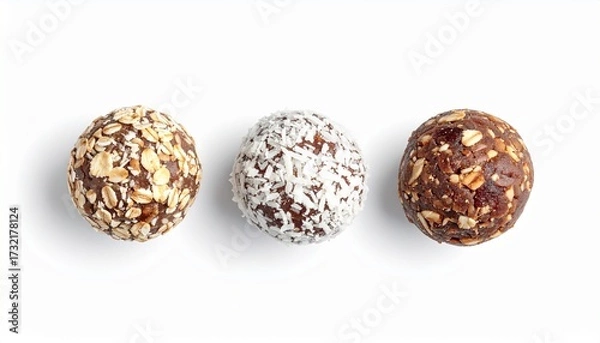 Fototapeta Three Healthy Energy Balls with Various Toppings on White Background