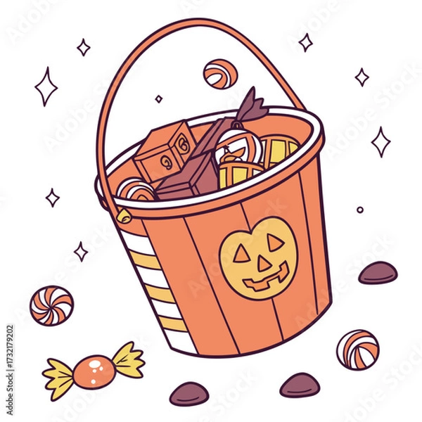 Fototapeta A bucket overflowing with halloween candy