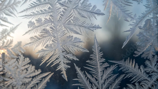 Fototapeta Frost patterns on glass, macro photography style, high resolution, abstract natural design, minimal background, perfect for textures and graphic design projects. Detailed close-up.