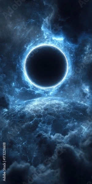Fototapeta A dark celestial body, ringed with vibrant blue energy, hovers above a stormy, cloud-covered landscape. The scene is dark and moody, with shades of blue and black dominating the image