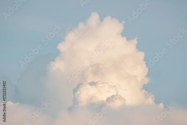 Fototapeta White fluffy cumulus clouds podium on blue sky with empty space background.Beauty cosmetic product placement pedestal present promotion minimal stand display,dreamy concept.