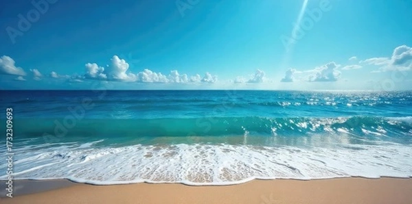 Fototapeta Vast expanse of deep blue ocean, waves crashing on a sandy shore, sunlight reflecting on the water's surface A tranquil yet powerful scene of nature's beauty , natural beauty, serenity