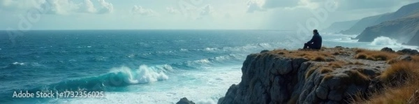 Fototapeta A solitary figure sits pensively on a windswept cliff overlooking a vast, dramatic ocean, embodying quiet contemplation and self-reliance , majestic, introspection, age