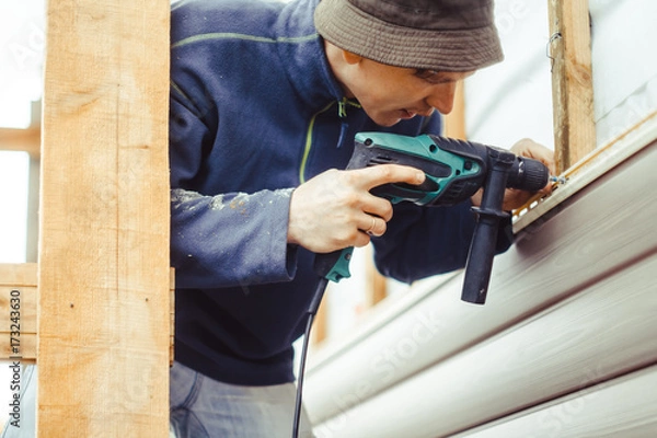 Obraz installation of siding