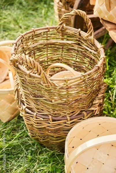 Fototapeta Woven straw or rattan baskets, an ancient technology of the 19th century