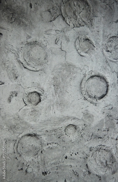 Fototapeta The texture of the lunar crater, plaster on the wall