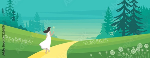 Fototapeta A woman in a flowing white dress walks down a sunlit path surrounded by lush green hills and trees, evoking feelings of freedom, nature, and tranquility in this idyllic scene.