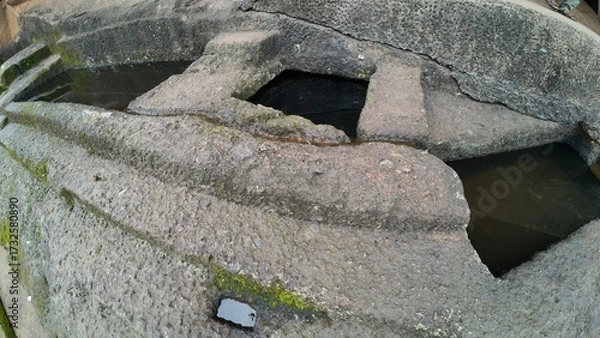 Obraz Engineering of the Ancients: Detailed View of a Carved Water Reservoir Used for Monastic Drinking Supply at the Historic Kanheri Caves Complex, Mumbai, India 