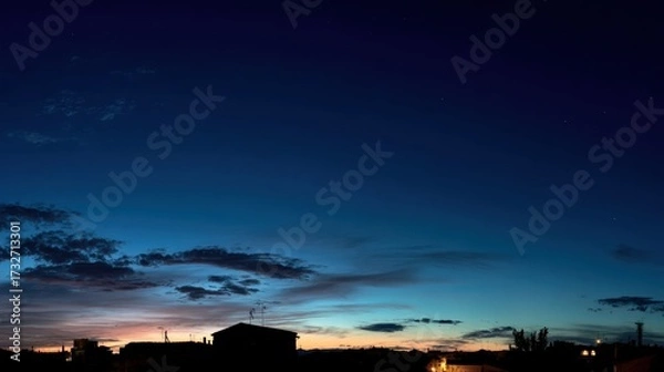 Obraz Twilight Sky Over Urban Landscape with Silhouetted Buildings