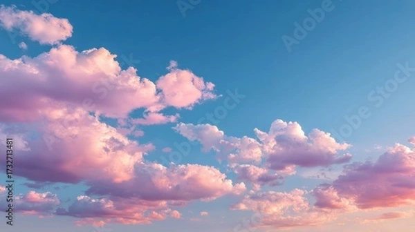 Obraz Serene Pink Clouds Against a Bright Blue Sky at Twilight