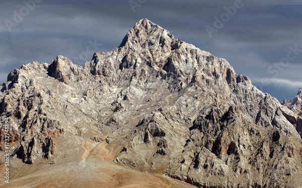 Fototapeta In Nigde Turkey, the Grand Demirkazik summit, the highest peak of the Aladağlar mountain range, on an autumn day