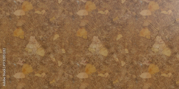Fototapeta Seamless brown granite texture with yellow and white specks, creating a natural stone pattern ideal for backgrounds and surface designs in interior decoration
