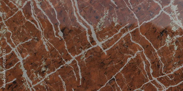 Fototapeta Closeup of polished red breccia marble with white veins, showcasing the stones natural pattern and texture, perfect for backgrounds and design elements