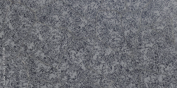 Fototapeta Closeup of a dark gray textured surface with tiny specks, creating a rough and grainy effect, ideal for backgrounds or abstract designs, full frame shot