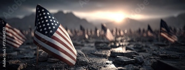 Fototapeta Hundreds of American flags waving proudly in a solemn landscape at sunset, honoring sacrifices with a view of distant mountains