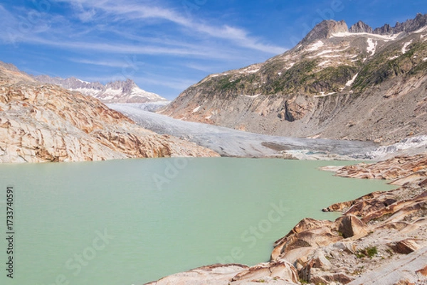 Fototapeta View of the Rhone Glacier and the glacial lake at Furka Pass in the Swiss Alps in canton of Valais, Switzerland