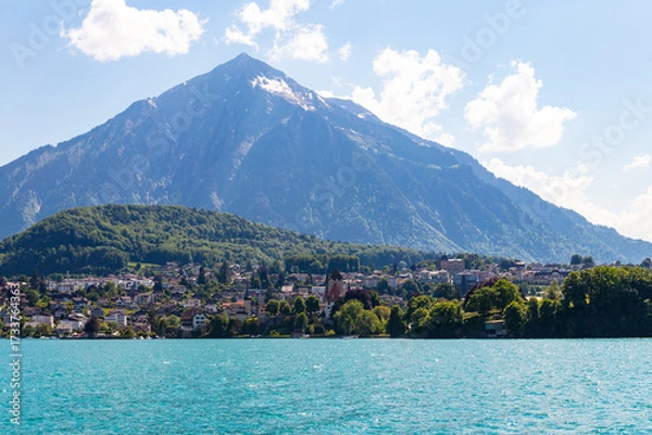 Fototapeta View of the Lake Thun and Niesen mountain (so called Swiss Pyramid) in Switzerland